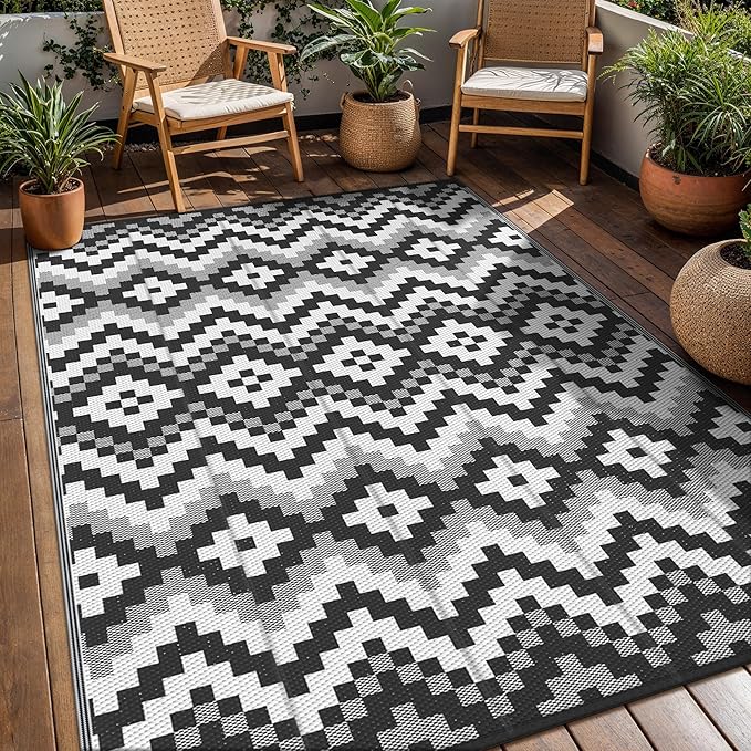 GENIMO Outdoor Rug for Patio, 6' x 9' Lightweight Waterproof Plastic Straw Rugs, Reversible Camping Carpet, Large Area Rugs Mat for RV, Deck, Balcony, Porch, Backyard, Black & White