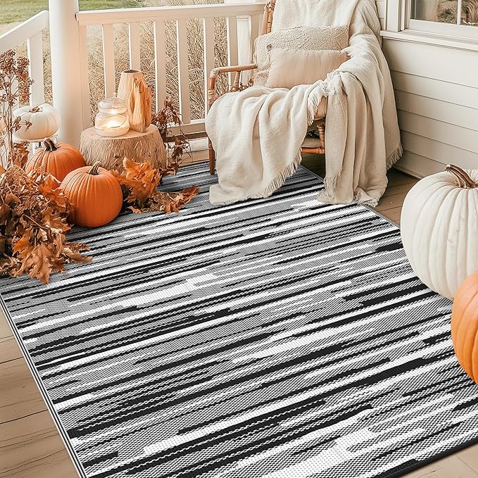 GENIMO Outdoor Rug for Patio Clearance, 6'x9' Waterproof Camping Mat, Reversible Plastic Straw Rugs for RV, Camper, Balcony, Backyard, Picnic, Deck (Black White)
